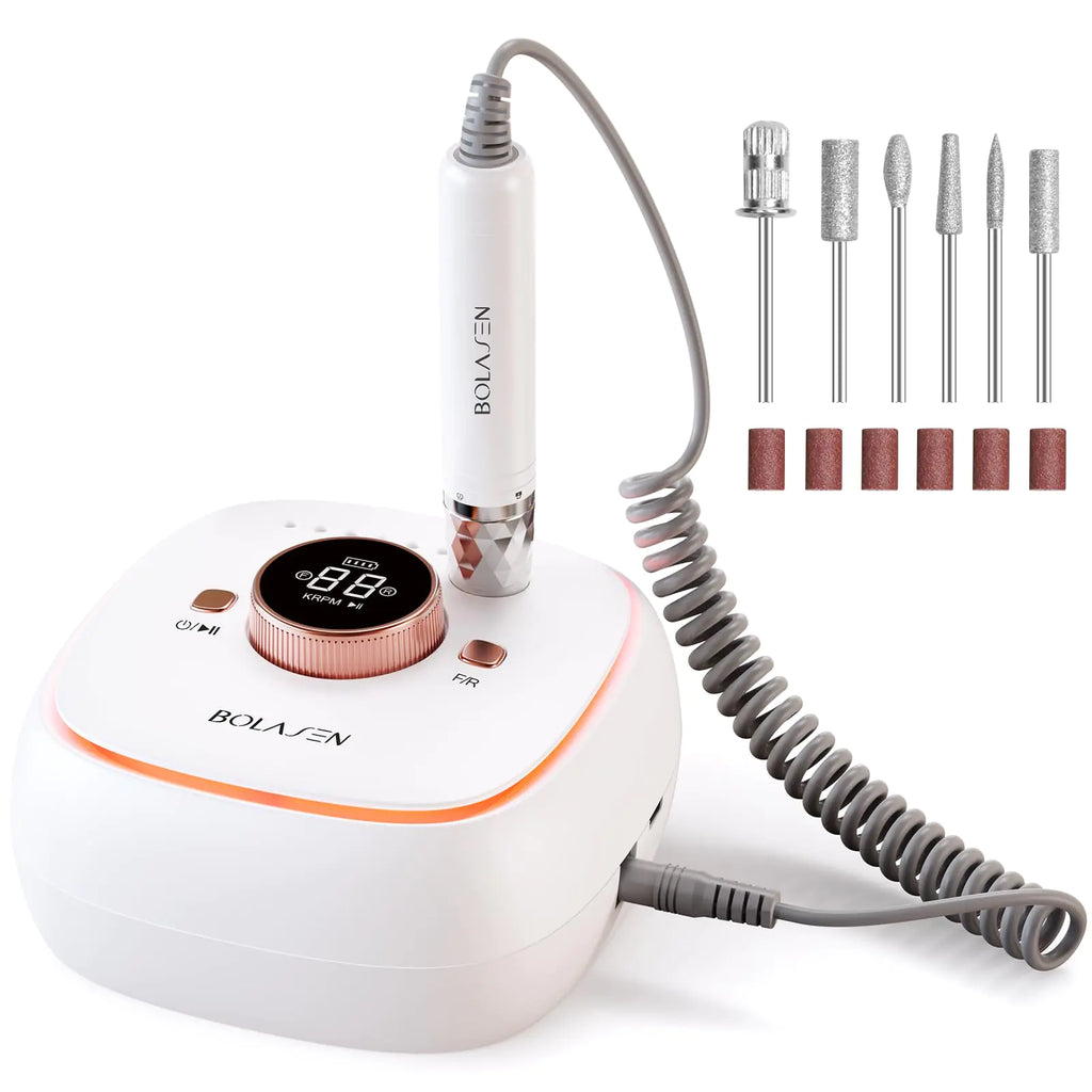 Nail drill with digital display and attachments on a white background